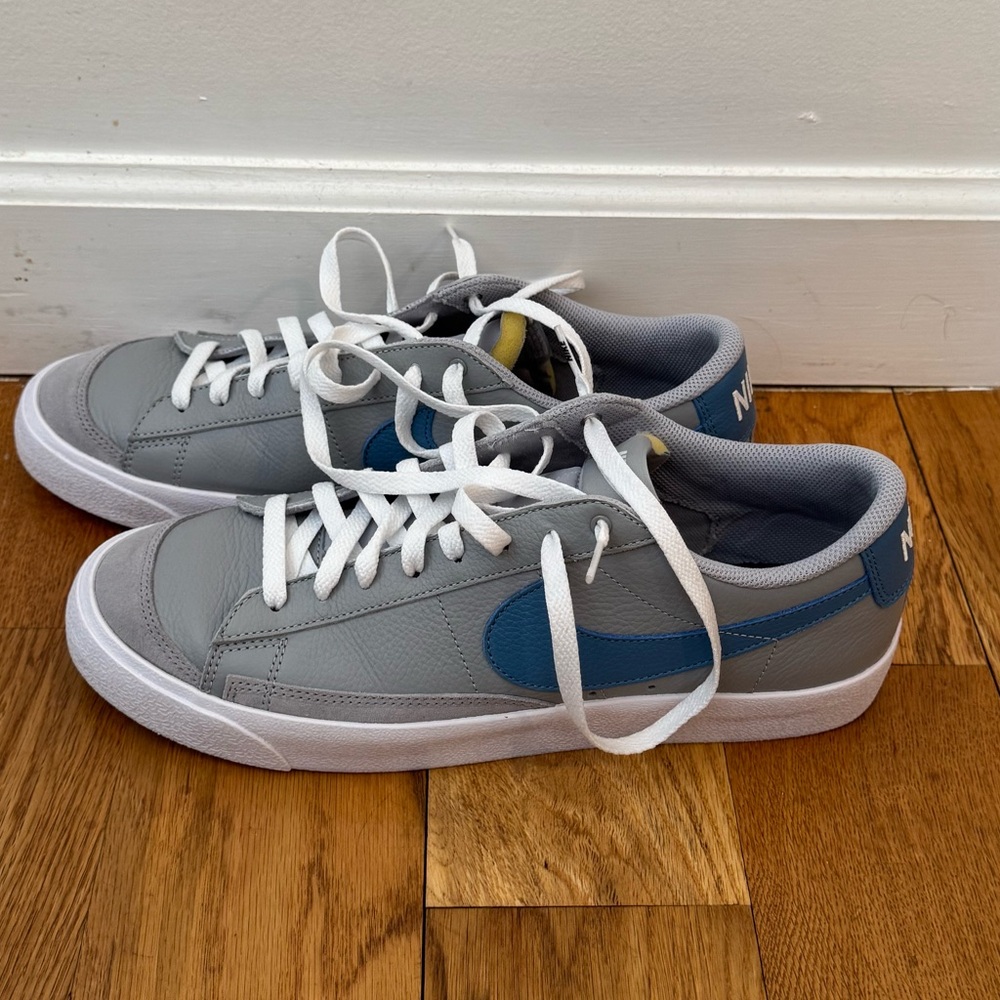 Nike Gray Sneakers with Blue Swoosh